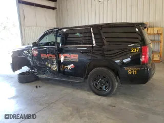 2020 Chevrolet Tahoe Commercial with VIN 1GNLCDEC1LR297818, listed as a Copart auction lot 74242524 with 35,716 mi miles and Salvage Title. Bid and sale history available at carsss.com. Image 2.