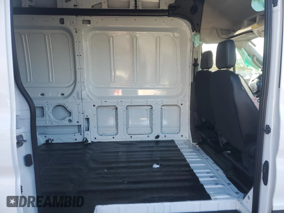 2023 Ford Transit Cargo z VIN 1FTBR1X8XPKB14862, wystawiony jako Copart lot #83661874 z przebiegiem Nie podano mil oraz Szkoda całkowita • Salvage title. Historia ofert i sprzedaży dostępna na DreamBid. Obrazek 11.