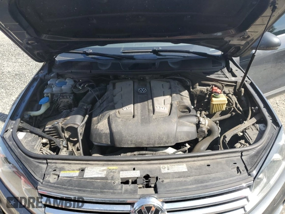 2015 Volkswagen Touareg Lux с VIN WVGEP9BP0FD006992, выставлен на аукционе Copart как лот 59524445 с пробегом 169 822 миль миль и Списание • Salvage title. История ставок и продаж доступна на DreamBid. Изображение 12.