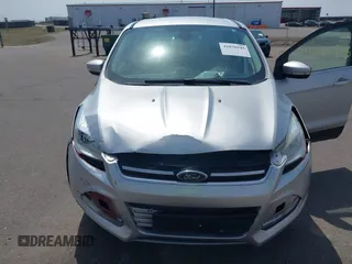 2013 Ford Escape SEL with VIN 1FMCU9H99DUA74813, listed as a IAAI auction lot 42070945 with 187,417 mi miles and . Bid and sale history available at DreamBid. Image 6.