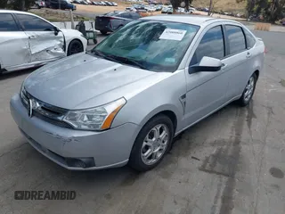 2008 Ford Focus SE with VIN 1FAHP35N18W199448, listed as a IAAI auction lot 42088860 with 174,391 mi miles. Bid and sale history available at carsss.com. Image 2.