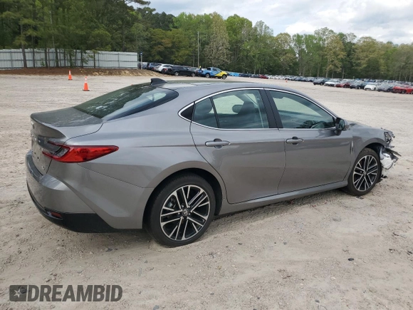 2025 Toyota Camry LE with VIN 4T1DAACKXSU556874, listed as a Copart auction lot 52694525 with 7,076 mi miles and Salvage Title. Bid and sale history available at carsss.com. Image 3.