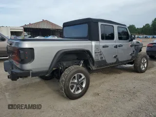 2020 Jeep Gladiator Sport S with VIN 1C6HJTAG9LL127546, listed as a Copart auction lot 54955945 with 99,511 mi miles and Salvage title. Bid and sale history available at DreamBid. Image 3.