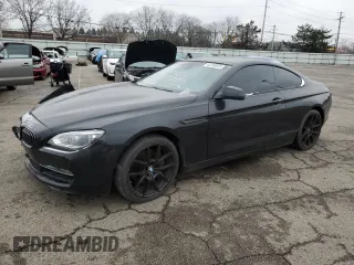 2012 BMW 6 Series 650i with VIN WBALX3C52CDV77690, listed as a Copart auction lot 43190635 with 102,448 mi miles and Salvage Title. Bid and sale history available at carsss.com. Image 1.
