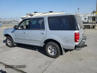 1997 Ford Expedition XLT z VIN 1FMEU1768VLA49281, wystawiony jako Copart lot #79895244 z przebiegiem 73 188 mil mil oraz Szkoda całkowita • Salvage title. Historia ofert i sprzedaży dostępna na DreamBid. Obrazek 2.