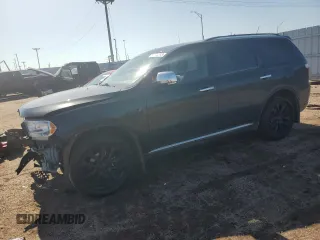 2013 Dodge Durango Crew with VIN 1C4RDJDG5DC701016, listed as a Copart auction lot 60832385 with 236,719 mi miles and Salvage title. Bid and sale history available at DreamBid. Image 1.