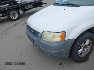 2004 Ford Escape XLS with VIN 1FMYU02104KB25647, listed as a IAAI auction lot 41916737 with 199,361 mi miles and . Bid and sale history available at DreamBid. Image 13.