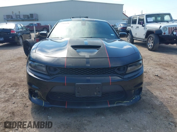2019 Dodge Charger R/T with VIN 2C3CDXCT2KH575297, listed as a IAAI auction lot 41661339 with 119,854 mi miles and . Bid and sale history available at DreamBid. Image 12.