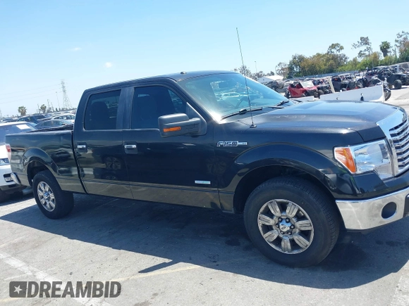 2012 Ford F-150 XL z VIN 1FTFW1CT5CFB34590, wystawiony jako IAAI lot #42279514 z przebiegiem 196 480 mil mil oraz . Historia ofert i sprzedaży dostępna na DreamBid. Obrazek 13.