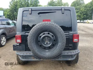 2009 Jeep Wrangler X with VIN 1J4FA24159L743572, listed as a Copart auction lot 63623425 with 138,964 mi miles and Clean title. Bid and sale history available at DreamBid. Image 6.