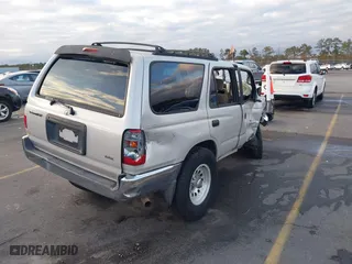 2000 Toyota 4Runner with VIN JT3GM84R4Y0053228, listed as a IAAI auction lot 41153788 with 276,024 mi miles. Bid and sale history available at carsss.com. Image 4.