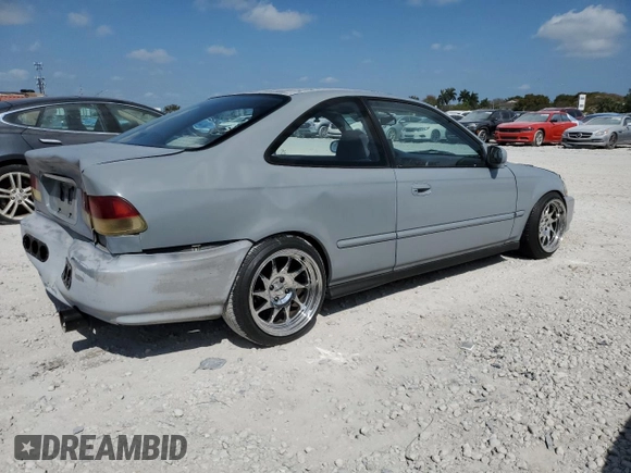 1997 Honda Civic EX z VIN 1HGEJ8143VL043998, wystawiony jako Copart lot #51795345 z przebiegiem 129 631 mil mil oraz Nie do naprawy • Non repairable. Historia ofert i sprzedaży dostępna na DreamBid. Obrazek 3.