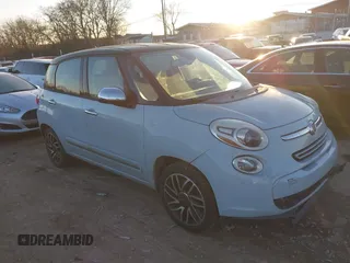 2015 FIAT 500L Lounge with VIN ZFBCFACH8FZ031314, listed as a IAAI auction lot 41392026 with 184,145 mi miles. Bid and sale history available at carsss.com. Image 1.
