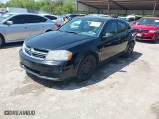 2014 Dodge Avenger SE with VIN 1C3CDZABXEN148452, listed as a IAAI auction lot 41924088 with 184,930 mi miles. Bid and sale history available at carsss.com. Image 2.