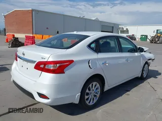 2018 Nissan Sentra SV z VIN 3N1AB7AP8JY259106, wystawiony jako IAAI lot #41899218 z przebiegiem 88 750 mil mil oraz . Historia ofert i sprzedaży dostępna na DreamBid. Obrazek 4.