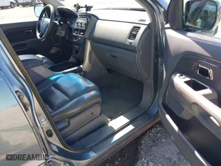 2006 Honda Pilot EX-L with RES with VIN 2HKYF18626H505792, listed as a IAAI auction lot 41861686 with 180,551 mi miles. Bid and sale history available at carsss.com. Image 5.