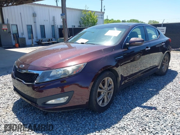 2011 Kia Optima EX with VIN KNAGN4A79B5129697, listed as a IAAI auction lot 42039540 with 226,627 mi miles and . Bid and sale history available at carsss.com. Image 2.