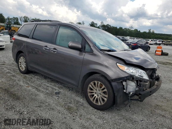 2012 Toyota Sienna XLE AAS with VIN 5TDYK3DC0CS251735, listed as a Copart auction lot 62208805 with 217,504 mi miles and Clean title. Bid and sale history available at DreamBid. Image 4.