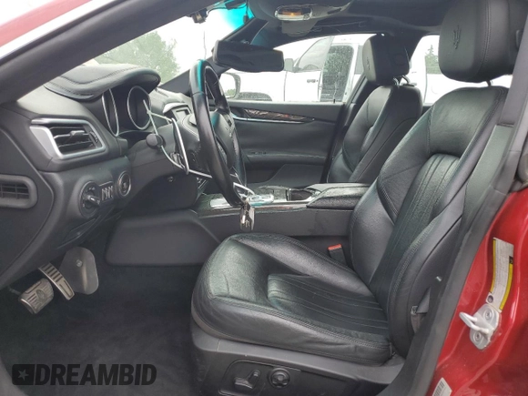 2014 Maserati Ghibli S Q4 with VIN ZAM57RTA7E1128937, listed as a Copart auction lot 54492205 with 79,897 mi miles and Salvage title. Bid and sale history available at DreamBid. Image 7.