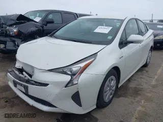 2016 Toyota Prius Two with VIN JTDKBRFU2G3503863, listed as a IAAI auction lot 42035013 with 118,930 mi miles. Bid and sale history available at carsss.com. Image 2.