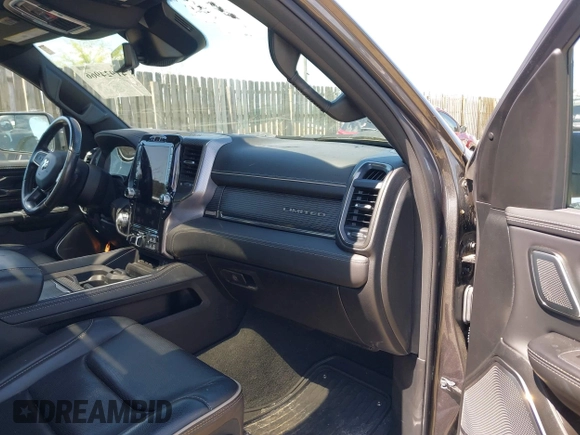 2021 Ram 1500 Limited with VIN 1C6SRFHT4MN677505, listed as a IAAI auction lot 41924966 with 51,121 mi miles and . Bid and sale history available at DreamBid. Image 5.