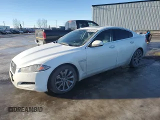 2015 Jaguar XF with VIN SAJXA0FS5FPU49437, listed as a Copart auction lot 84757254 with 99,301 mi miles and Salvage Title. Bid and sale history available at DreamBid. Image 1.