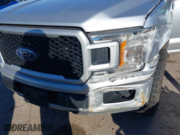 2019 Ford F-150 XL with VIN 1FTEW1CP6KFD42734, listed as a IAAI auction lot 41260505 with 101,702 mi miles and . Bid and sale history available at carsss.com. Image 6.