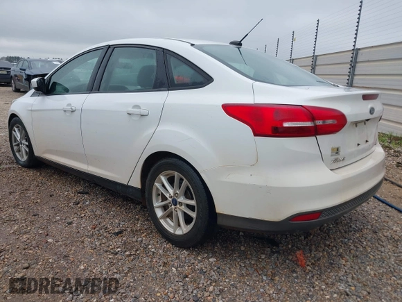 2018 Ford Focus SE z VIN 1FADP3F23JL225333, wystawiony jako IAAI lot #41758445 z przebiegiem 133 307 mil mil oraz . Historia ofert i sprzedaży dostępna na DreamBid. Obrazek 3.