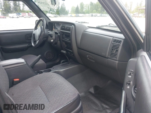 1999 Jeep Cherokee Sport with VIN 1J4FF68S5XL677243, listed as a IAAI auction lot 42221329 with 293,808 mi miles and . Bid and sale history available at DreamBid. Image 5.