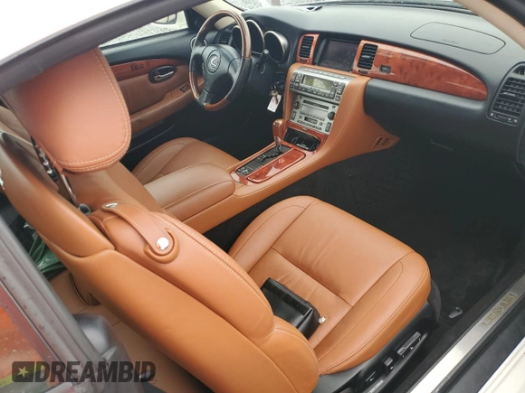 2003 Lexus SC 430 with VIN JTHFN48Y030045309, listed as a Copart auction lot 59034585 with 104,167 mi miles and Salvage title. Bid and sale history available at DreamBid. Image 8.