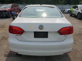 2014 Volkswagen Jetta TDI w/Premium z VIN 3VWLL7AJ6EM421646, wystawiony jako Copart lot #59305895 z przebiegiem Nie podano mil oraz Szkoda całkowita • Salvage title. Historia ofert i sprzedaży dostępna na DreamBid. Obrazek 6.
