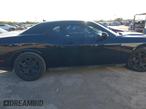 2016 Dodge Challenger SXT Plus z VIN 2C3CDZAG5GH345617, wystawiony jako IAAI lot #40801879 z przebiegiem 94 610 mil mil oraz . Historia ofert i sprzedaży dostępna na DreamBid. Obrazek 13.