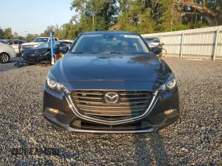 2018 Mazda 3 Touring z VIN 3MZBN1L33JM235106, wystawiony jako Copart lot #58272365 z przebiegiem 28 844 mil mil oraz Szkoda całkowita • Salvage title. Historia ofert i sprzedaży dostępna na DreamBid. Obrazek 5.