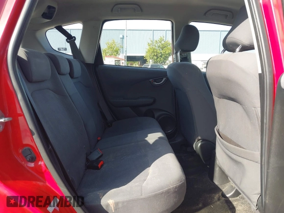2009 Honda Fit with VIN JHMGE88299S003581, listed as a IAAI auction lot 42094464 with 187,280 mi miles. Bid and sale history available at carsss.com. Image 8.