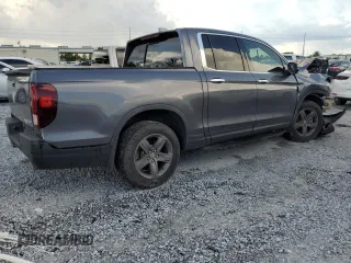 2023 Honda Ridgeline RTL-E with VIN 5FPYK3F79PB010418, listed as a Copart auction lot 62272845 with 39,739 mi miles and Salvage title. Bid and sale history available at DreamBid. Image 3.