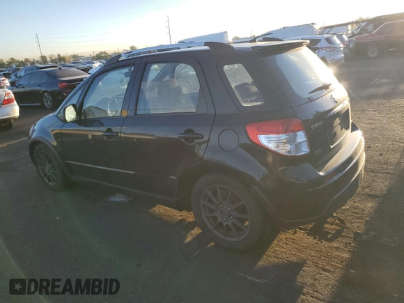 2009 Suzuki SX4 Man Touring Pkg AWD with VIN JS2YB417195101117, listed as a Copart auction lot 71102744 with 137,707 mi miles and Salvage Title. Bid and sale history available at carsss.com. Image 2.