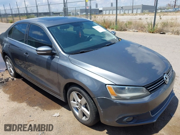 2012 Volkswagen Jetta TDI w/Premium with VIN 3VWLL7AJ1CM307485, listed as a IAAI auction lot 42384300 with 118,958 mi miles and . Bid and sale history available at DreamBid. Image 1.