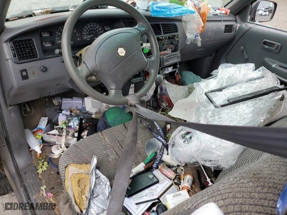 1996 Toyota T100 DX with VIN JT4UN22D1T0019000, listed as a Copart auction lot 55930744 with 253,849 mi miles and Salvage Title. Bid and sale history available at carsss.com. Image 8.