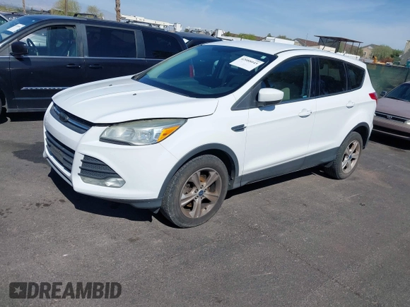2013 Ford Escape SE with VIN 1FMCU9GX8DUA42581, listed as a IAAI auction lot 42088045 with 153,145 mi miles. Bid and sale history available at carsss.com. Image 2.