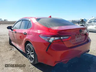 2023 Toyota Camry SE with VIN 4T1T11AK7PU133224, listed as a IAAI auction lot 41410565 with 42,559 mi miles. Bid and sale history available at carsss.com. Image 3.