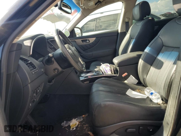 2015 Infiniti QX70 z VIN JN8CS1MW3FM483727, wystawiony jako Copart lot #55783285 z przebiegiem Nie podano mil oraz Czysty tytuł • Clean title. Historia ofert i sprzedaży dostępna na DreamBid. Obrazek 7.