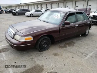 2001 Ford Crown Victoria LX z VIN 2FAFP74W51X104697, wystawiony jako Copart lot #59204225 z przebiegiem 56 264 mil mil oraz Szkoda całkowita • Salvage title. Historia ofert i sprzedaży dostępna na DreamBid. Obrazek 1.