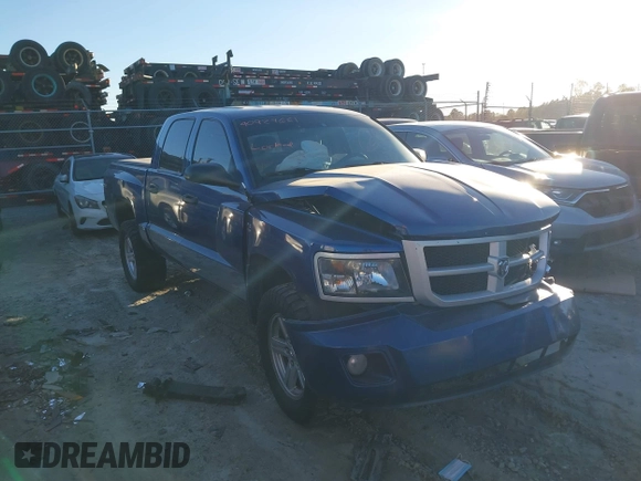2010 Dodge Dakota Bighorn/Lonestar with VIN 1D7CW3GP5AS130870, listed as a IAAI auction lot 40929651 with 128,077 mi miles. Bid and sale history available at carsss.com. Image 12.