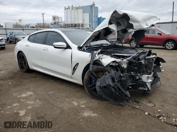 2022 BMW 8 Series 840i with VIN WBAGV4C01NCJ30083, listed as a Copart auction lot 81356084 with 61,868 mi miles and Salvage title. Bid and sale history available at DreamBid. Image 4.