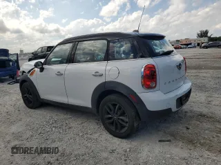 2013 MINI Countryman with VIN WMWZB3C5XDWM31715, listed as a Copart auction lot 57028565 with 95,453 mi miles and Salvage title. Bid and sale history available at DreamBid. Image 2.