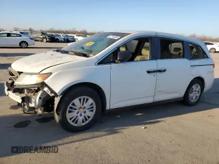 2015 Honda Odyssey LX с VIN 5FNRL5H21FB028529, выставлен на аукционе Copart как лот 87748055 с пробегом 224 907 миль миль и Списание • Salvage title. История ставок и продаж доступна на DreamBid. Изображение 1.
