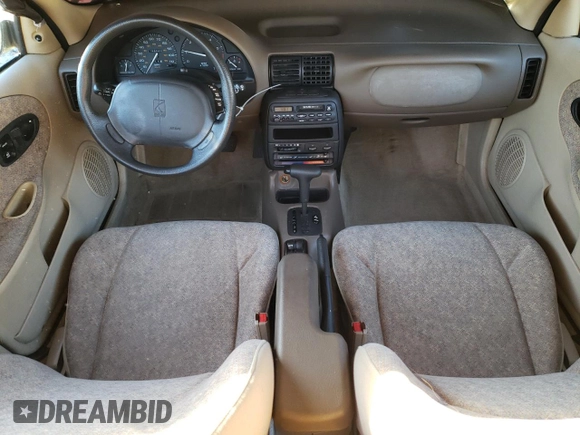1997 Saturn SL z VIN 1G8ZH5285VZ122690, wystawiony jako Copart lot #81655244 z przebiegiem 159 048 mil mil oraz Szkoda całkowita • Salvage title. Historia ofert i sprzedaży dostępna na DreamBid. Obrazek 8.