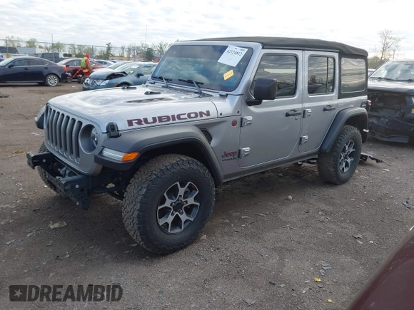 2021 Jeep Wrangler Unlimited Rubicon with VIN 1C4HJXFNXMW560512, listed as a IAAI auction lot 42124812 with 18,034 mi miles and . Bid and sale history available at DreamBid. Image 18.