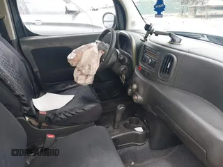 2010 Nissan Cube S z VIN JN8AZ2KR0AT166802, wystawiony jako IAAI lot #42165927 z przebiegiem 199 990 mil mil oraz . Historia ofert i sprzedaży dostępna na DreamBid. Obrazek 5.