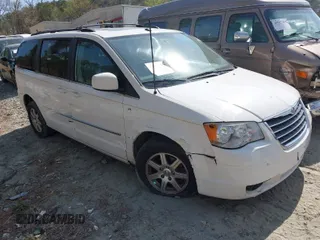 2009 Chrysler Town & Country Touring with VIN 2A8HR54169R626334, listed as a IAAI auction lot 41904158 with 217,264 mi miles and . Bid and sale history available at DreamBid. Image 1.